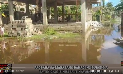 VIDEO REPORT - PAGBAHA SA MABABANG BAHAGI NG PUROK 3 A SA TINIGAO, ISINISI SA ITINAYONG PADER